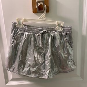 Silver metallic shorts in size XS. Good condition